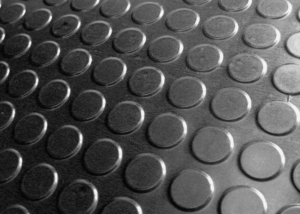 Black rubber floor with embossed buttons buttons pads Main Suprastud