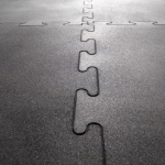 Rubber tiles with airtight puzzle joints