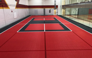 Detachable indoor pickleball track with Bergo Ultimate Flow tiles